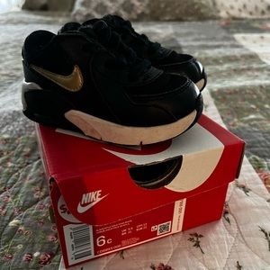 Nike black/gold white infant tennis shoes